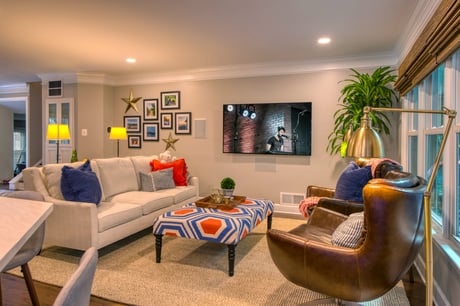 Reston living room with white molding around ceiling