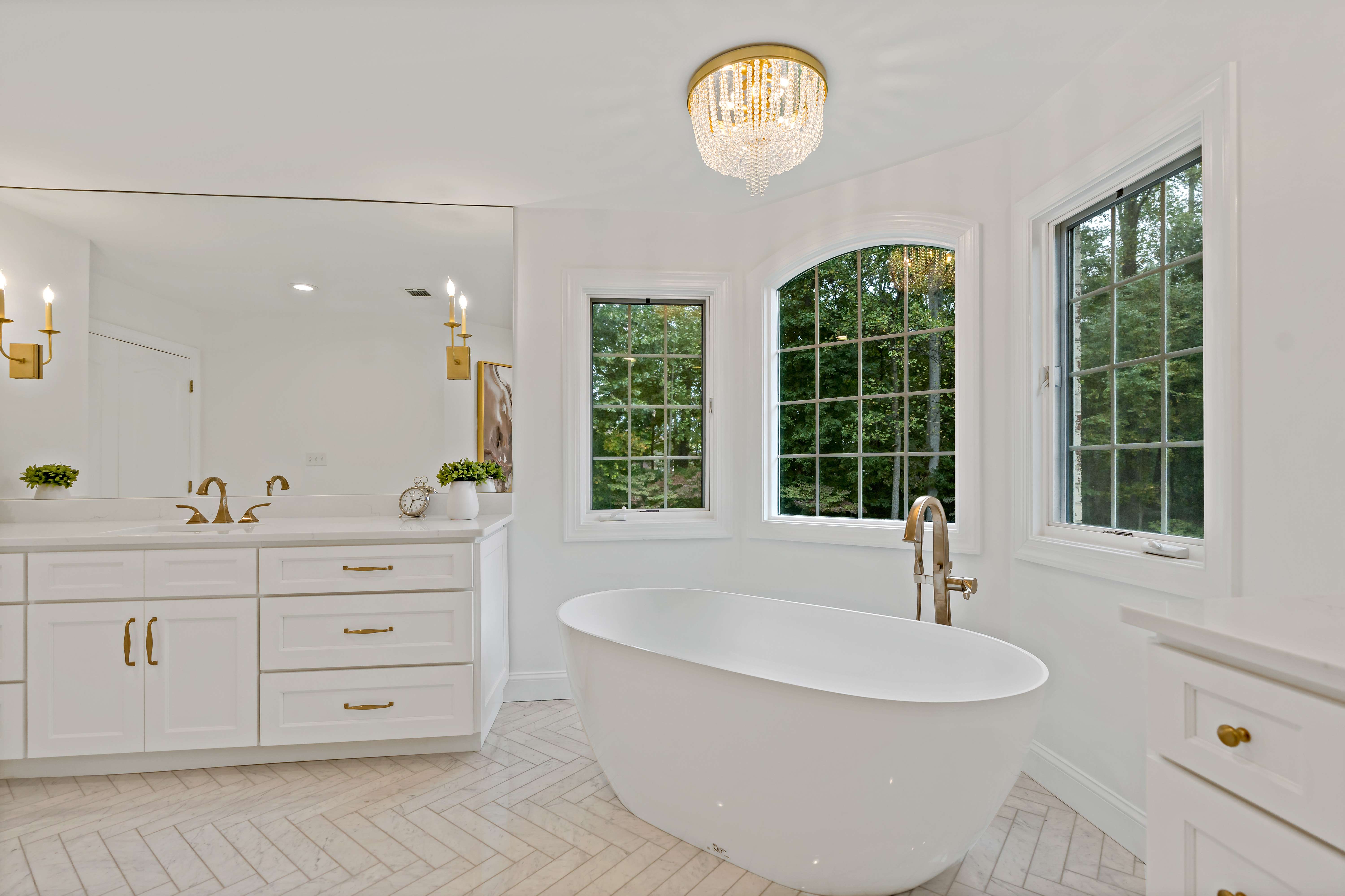 White Marble Tiled Niches Filled with Candles Over Tub - Transitional -  Bathroom
